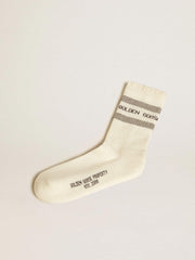 White socks with distressed details and gray stripes