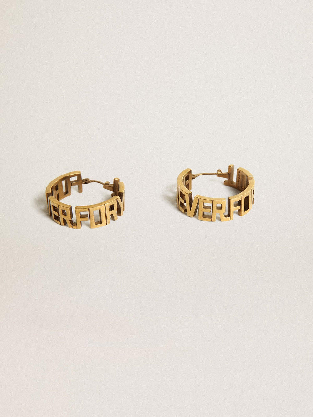 Hoop earrings in antique gold color with Forever For You lettering