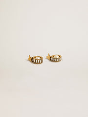 Earrings with gold star and pearl
