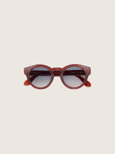 precious stones and blue lenses Cameron Panthos sunglasses with honey frame