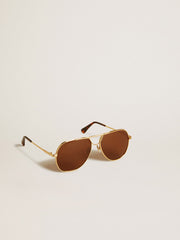 Aviator style sunglasses with gold frame and brown lenses