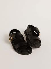 Women's Lucy sandal in glossy black leather with gold metal buckle