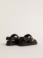 Women's Lucy sandal in glossy black leather with gold metal buckle