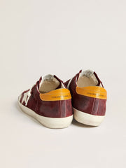 Men’s Super-Star in brick-red suede with white leather star and animal-print heel tab