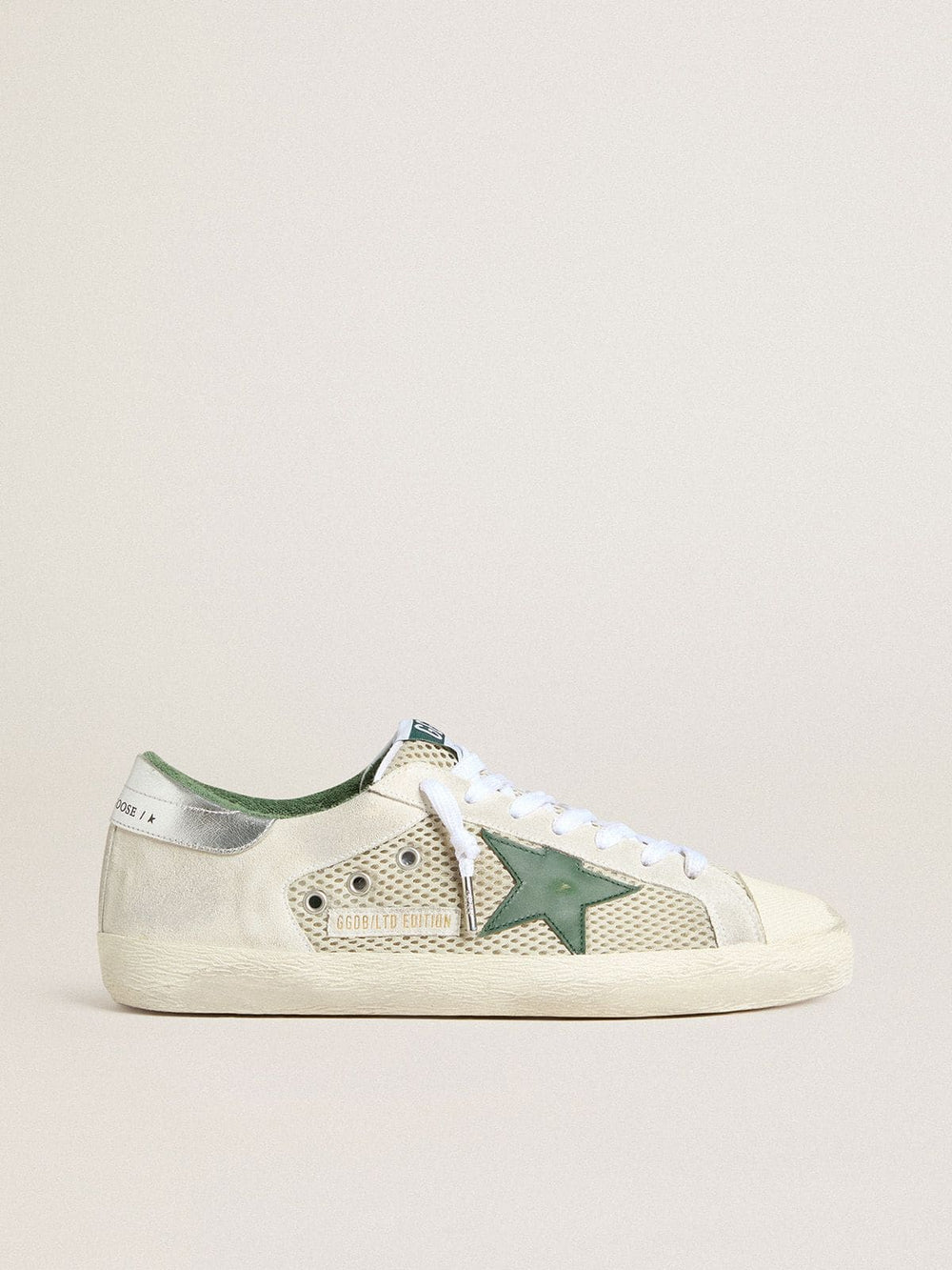 Men’s Super-Star LTD in white suede and mesh with green leather star and silver heel tab