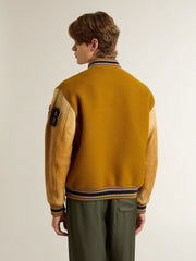 Ochre yellow wool bomber jacket with leather sleeves