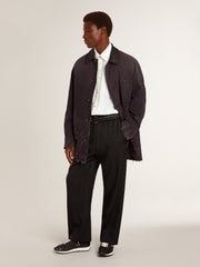 Men's denim jacket with distressed details and leather collar