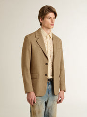 Men's single-breasted blazer in a sand-colored chevron linen blend.