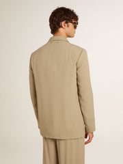 Men's beige pinstripe single-breasted jacket with an oversized fit