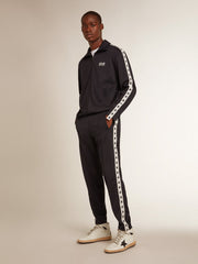 Dark blue sweatshirt with white strip and contrasting blue stars