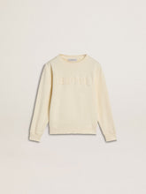 Girls’ cream-colored sweatshirt with patch writing
