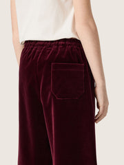 Girls’ burgundy velvet-effect pants with rear pocket