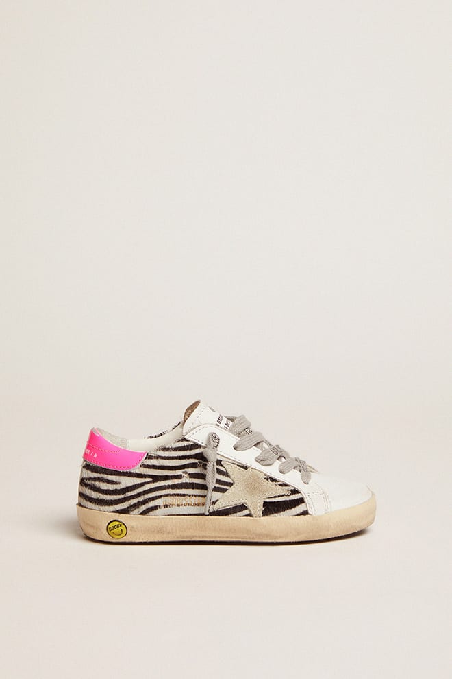 Junior Super-Star in leather and zebra-print pony skin with fuchsia heel tab