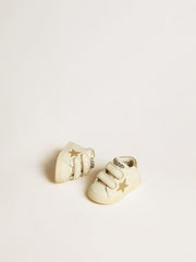 June Junior in white nappa leather with gold glitter star and heel tab