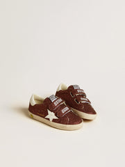 Old School Junior in burgundy glitter with leather star and heel tab