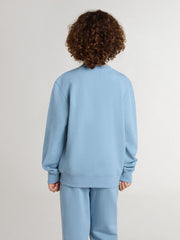 Boys' light blue sweatshirt with lettering on the front