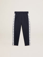 Dark blue joggers with white strip and contrasting stars