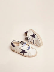 Old School Young in white leather with blue suede star and heel tab