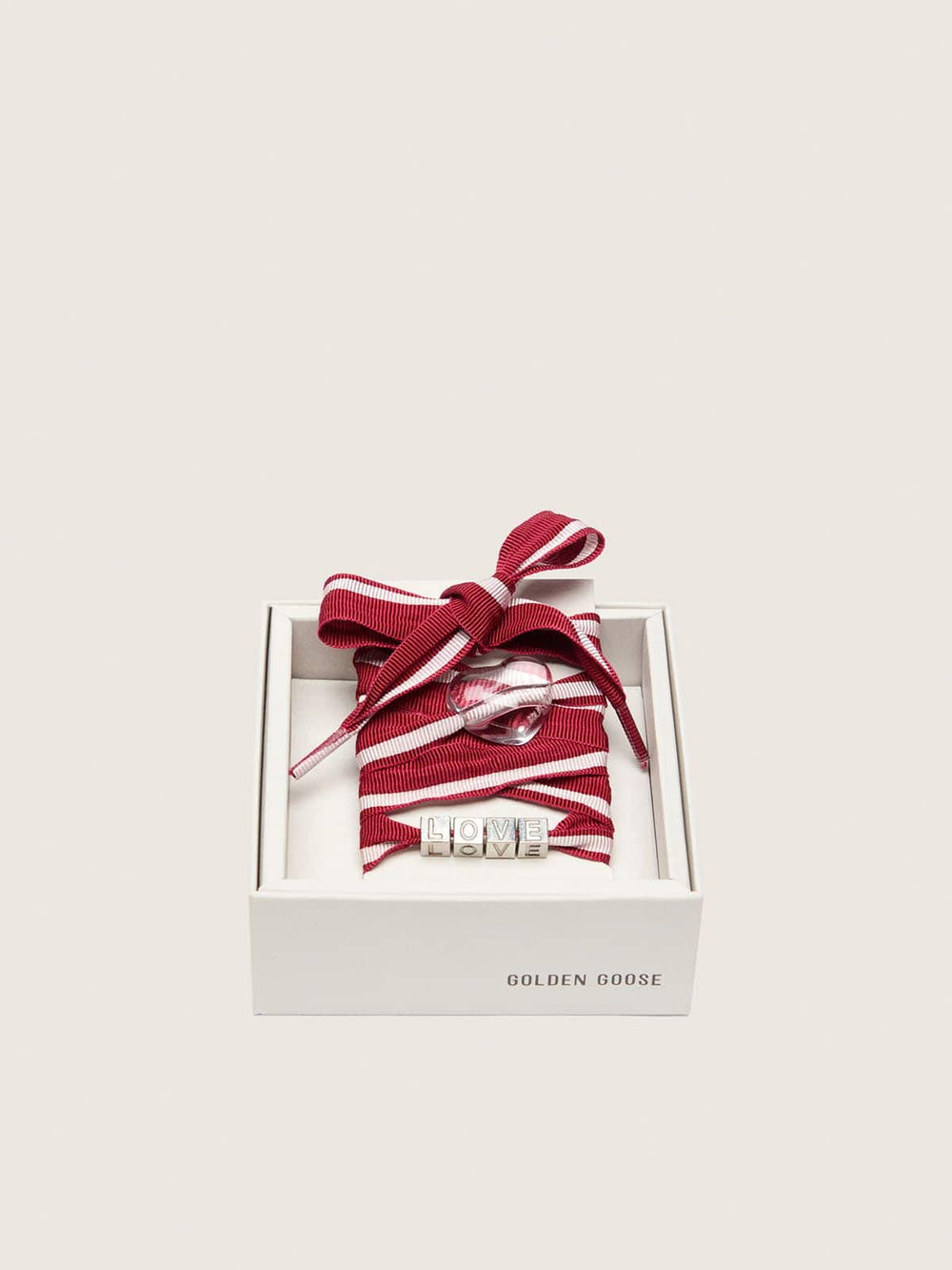 Skins red and white striped laces with charms