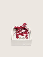 Skins red and white striped laces with charms