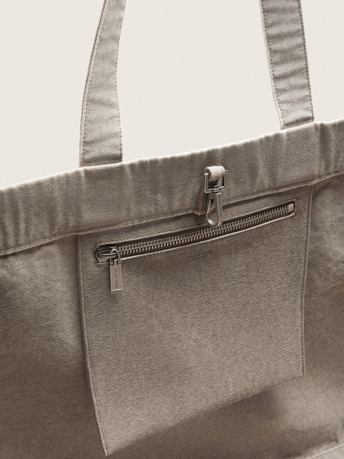 Anthracite canvas tote bag with embroidery and antique silver details