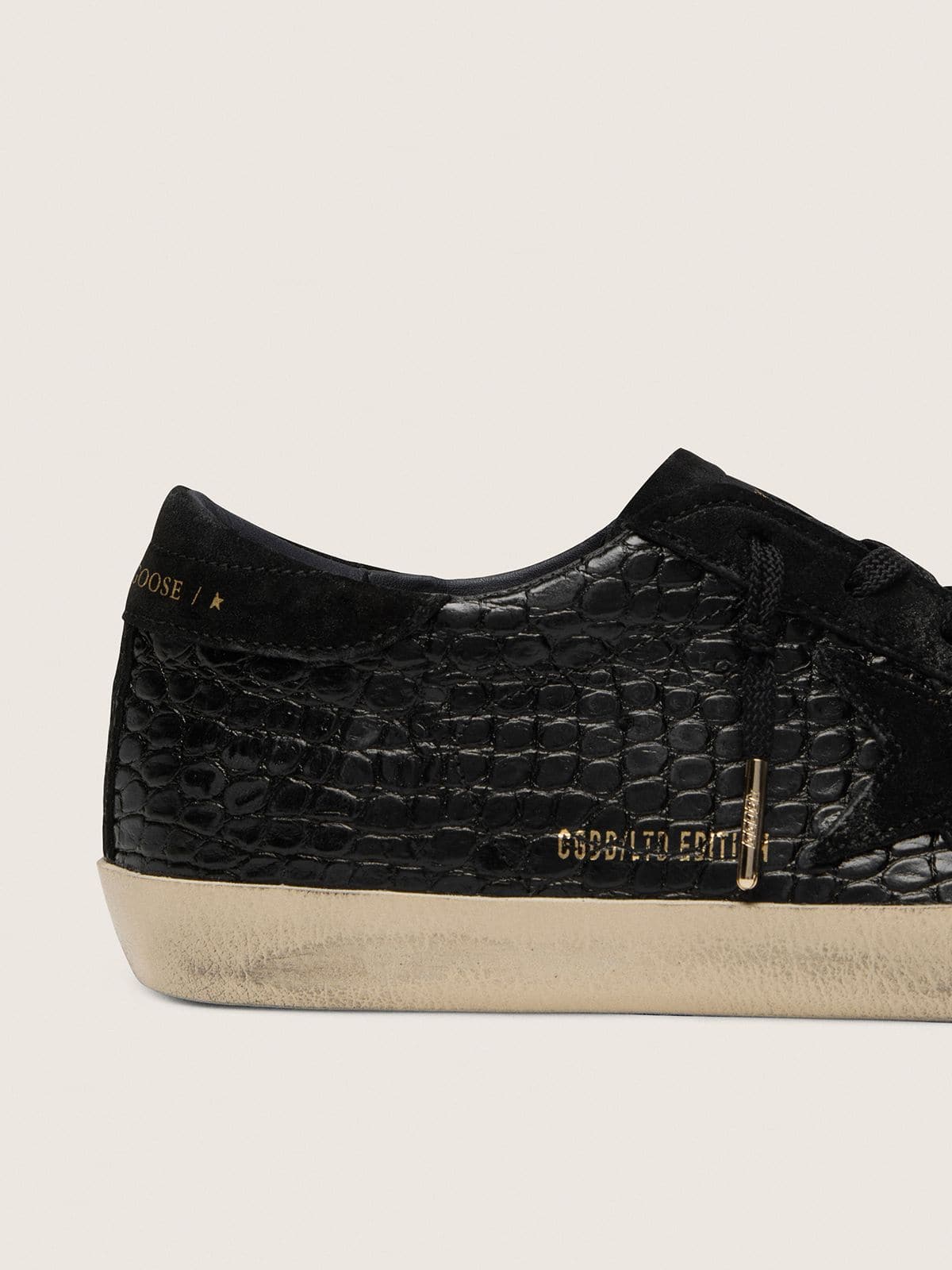 Women's Super-Star LTD in black croc-print leather with black suede star and heel tab