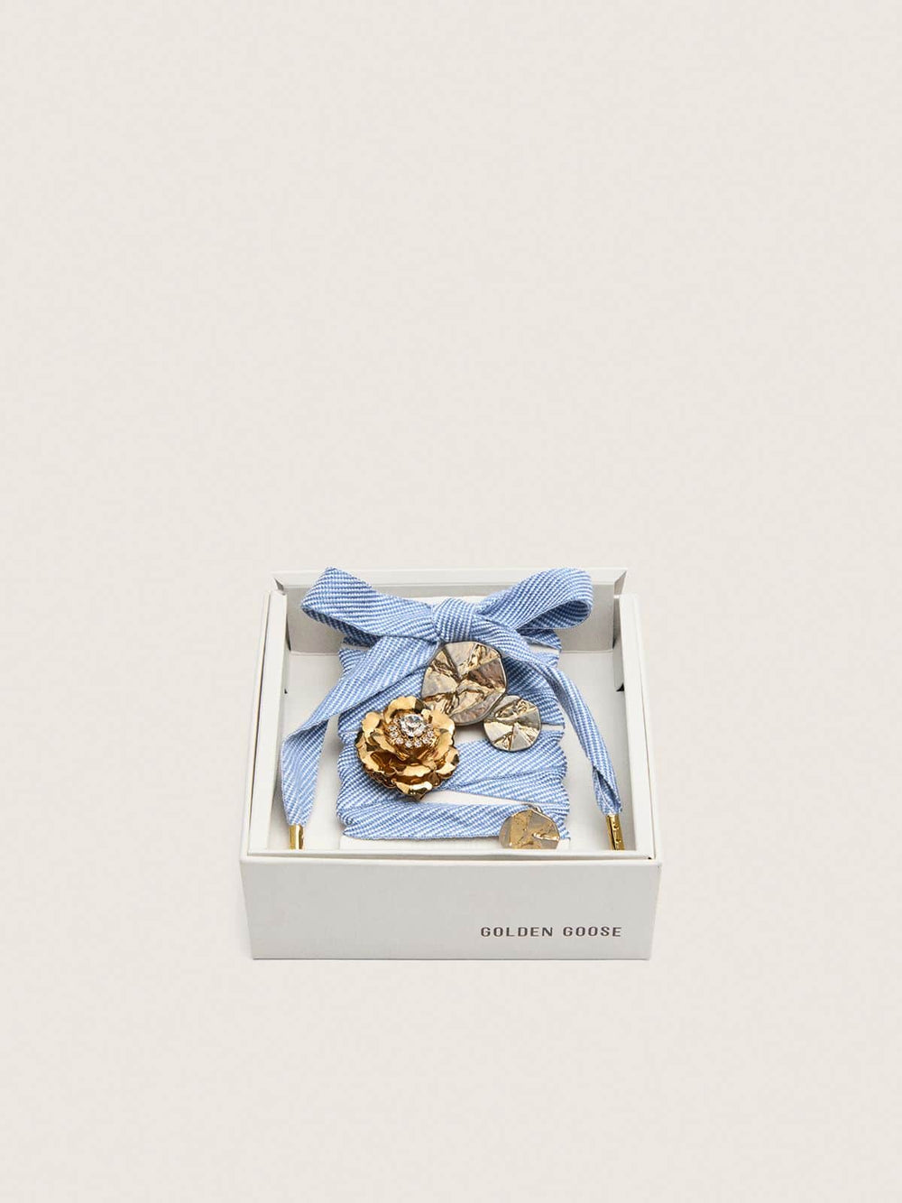 Skins light blue and white herringbone laces embellished with charms