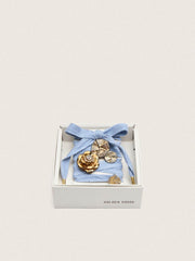 Skins light blue and white herringbone laces embellished with charms