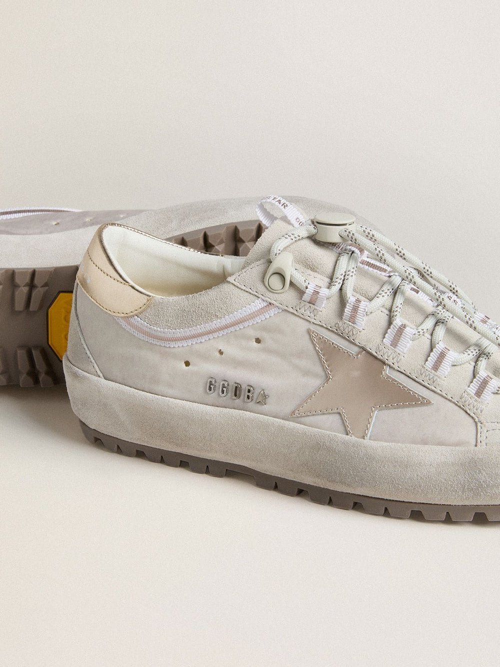 Women's Super-Star Ski in light gray nylon with metallic leather star and heel tab