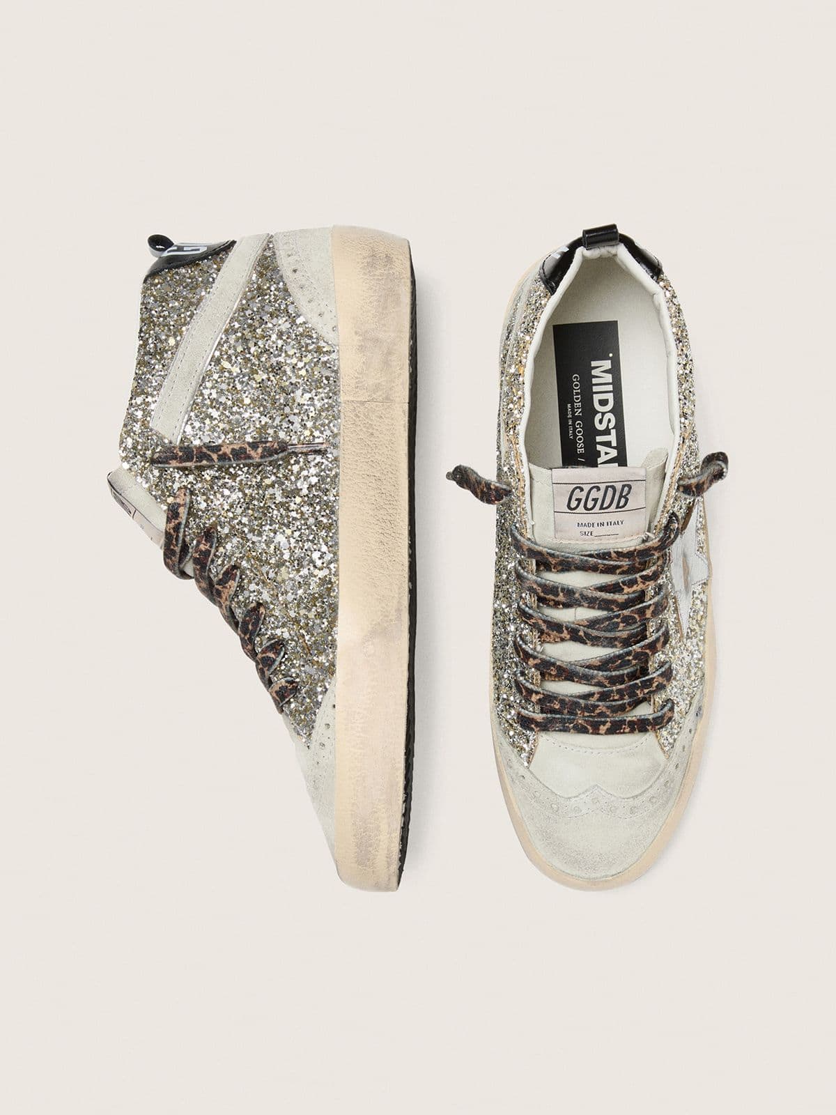 Mid Star in silver glitter with silver metallic leather star