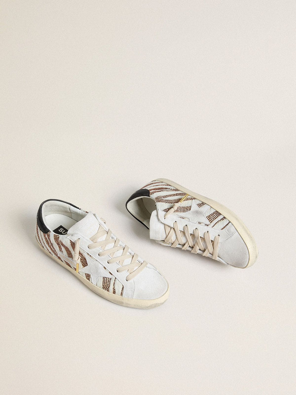 Women’s Super-Star LTD in white pony skin with brown glitter and white suede star