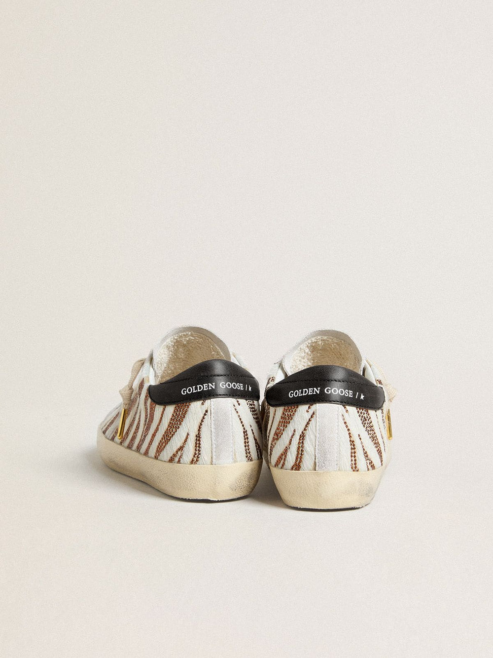 Women’s Super-Star LTD in white pony skin with brown glitter and white suede star