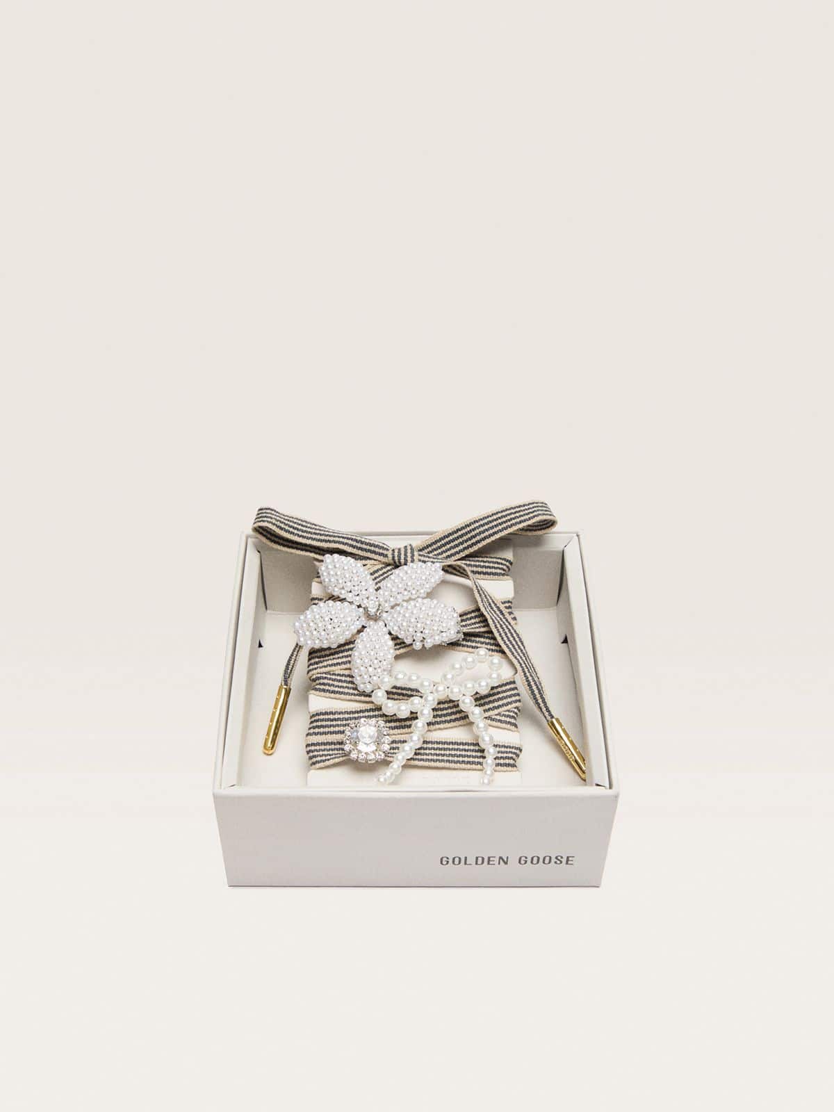 Skins black and beige striped laces with beaded and sparkling charms