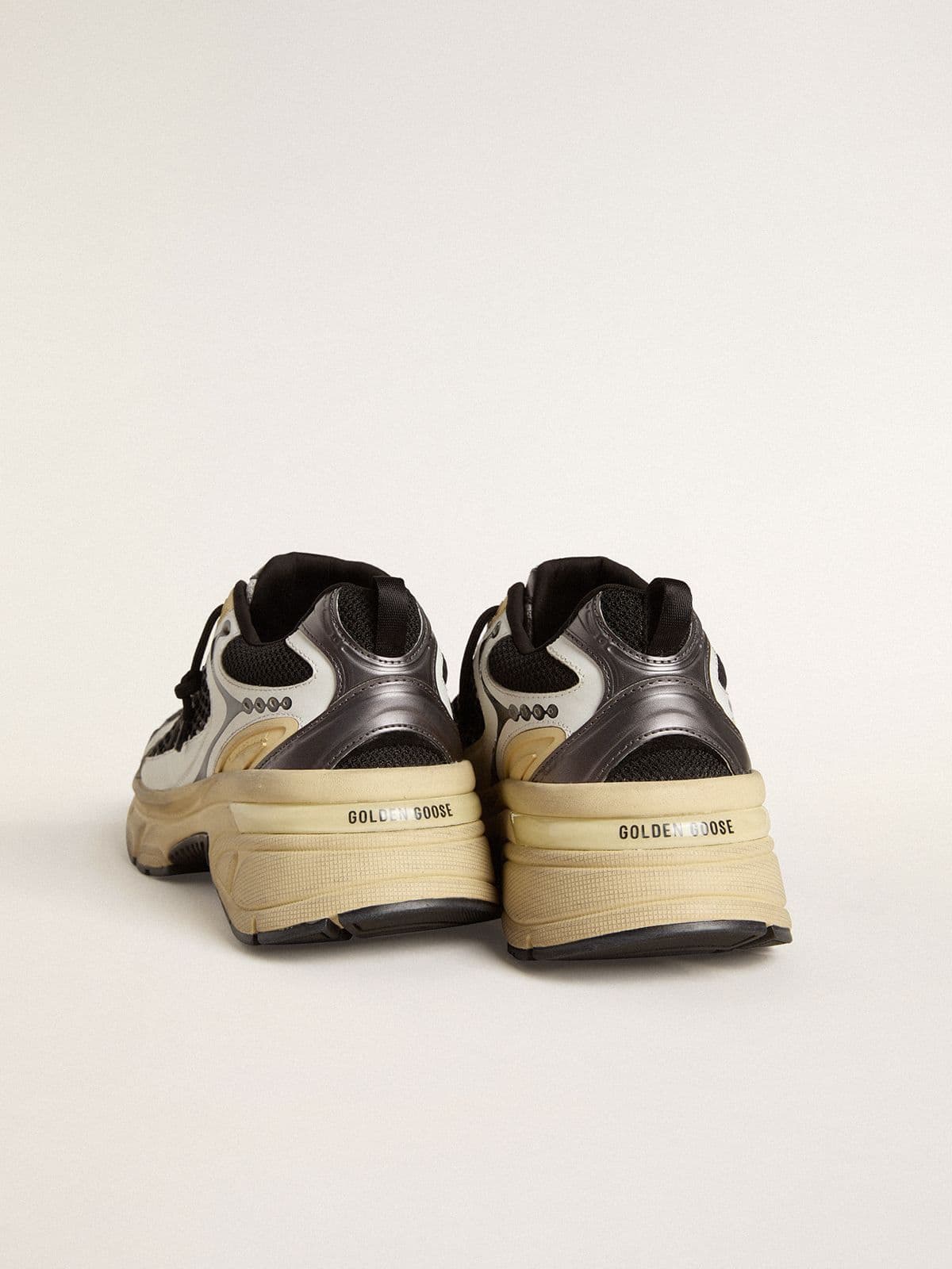 Women’s Lightstar in white leather and black mesh with black TPU star