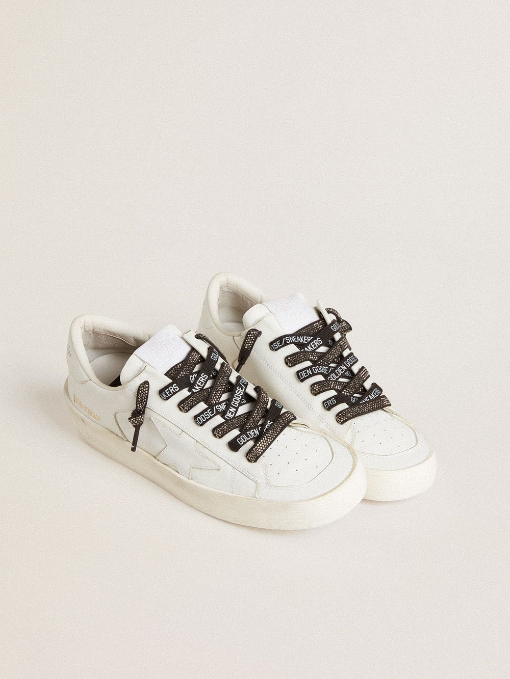 Black cotton laces with silver Swarovski crystals and white logo