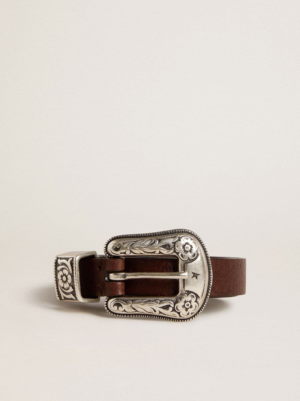 Women's dark brown leather belt with decorated silver buckle