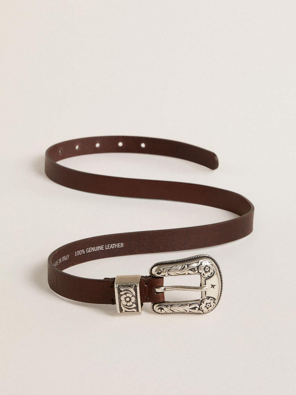 Women's dark brown leather belt with decorated silver buckle