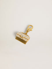 Purse-shaped charm in gold-colored brass with crystals
