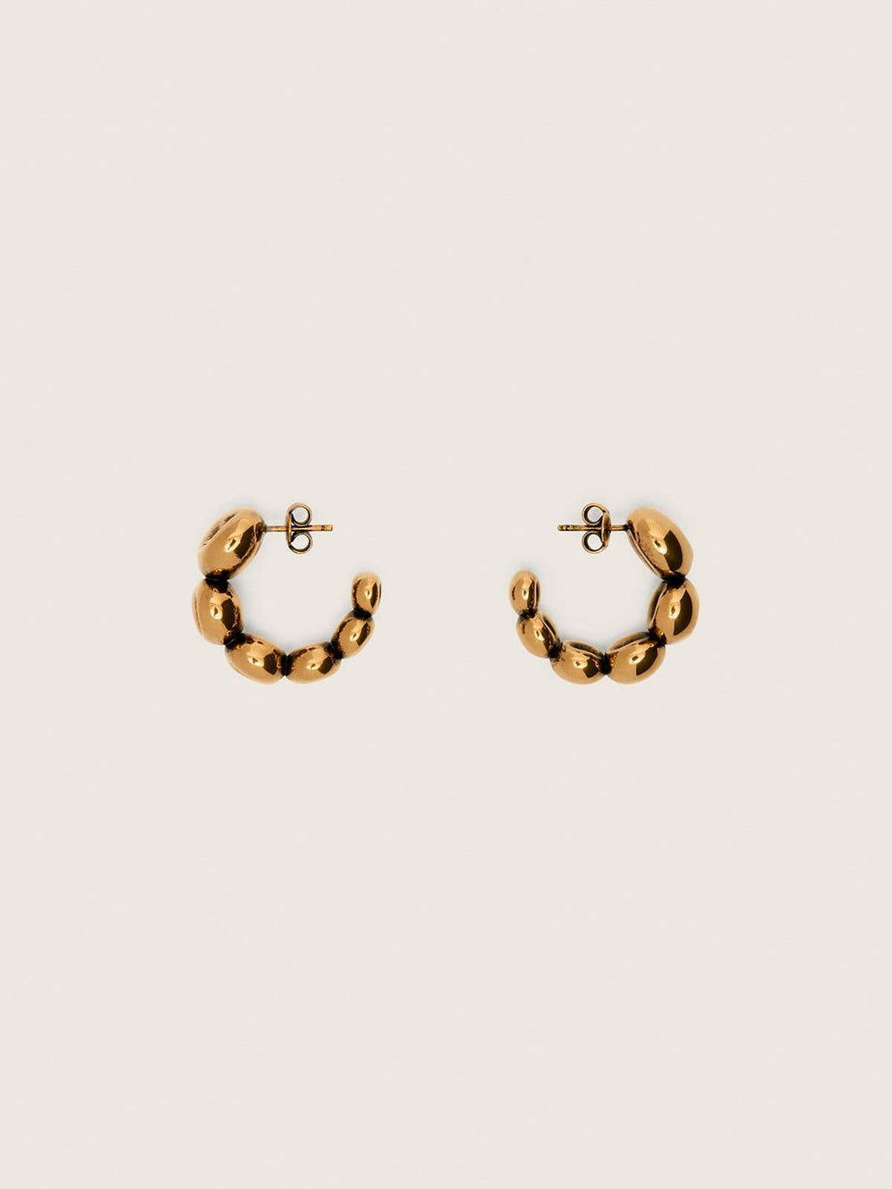 Hoop earrings with antique gold-colored studs