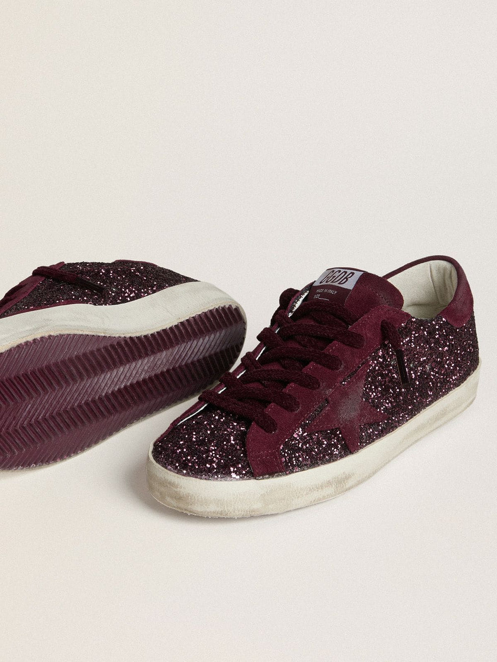 Women's Super-Star LTD in cherry glitter with cherry suede star