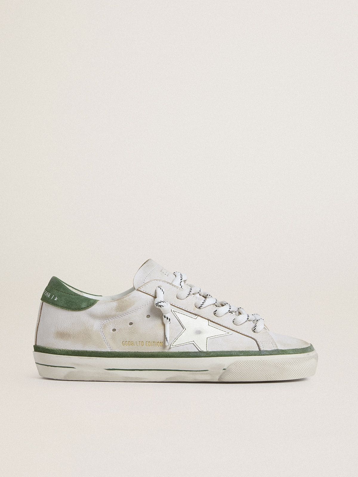 Women's Super-Star LTD with white leather star and green suede heel tab