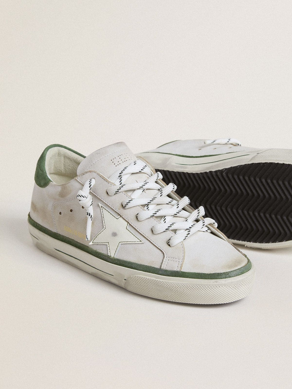 Women's Super-Star LTD with white leather star and green suede heel tab