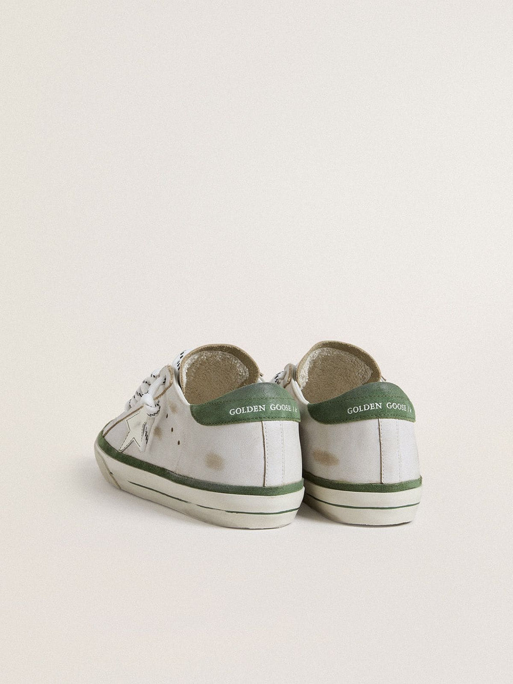 Women's Super-Star LTD with white leather star and green suede heel tab