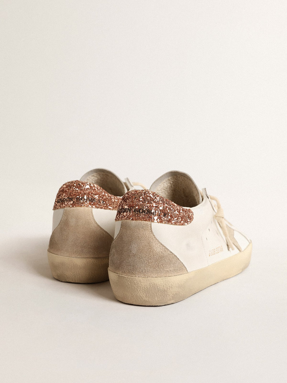 Women's Super-Star with a suede star and peach-pink glitter heel tab