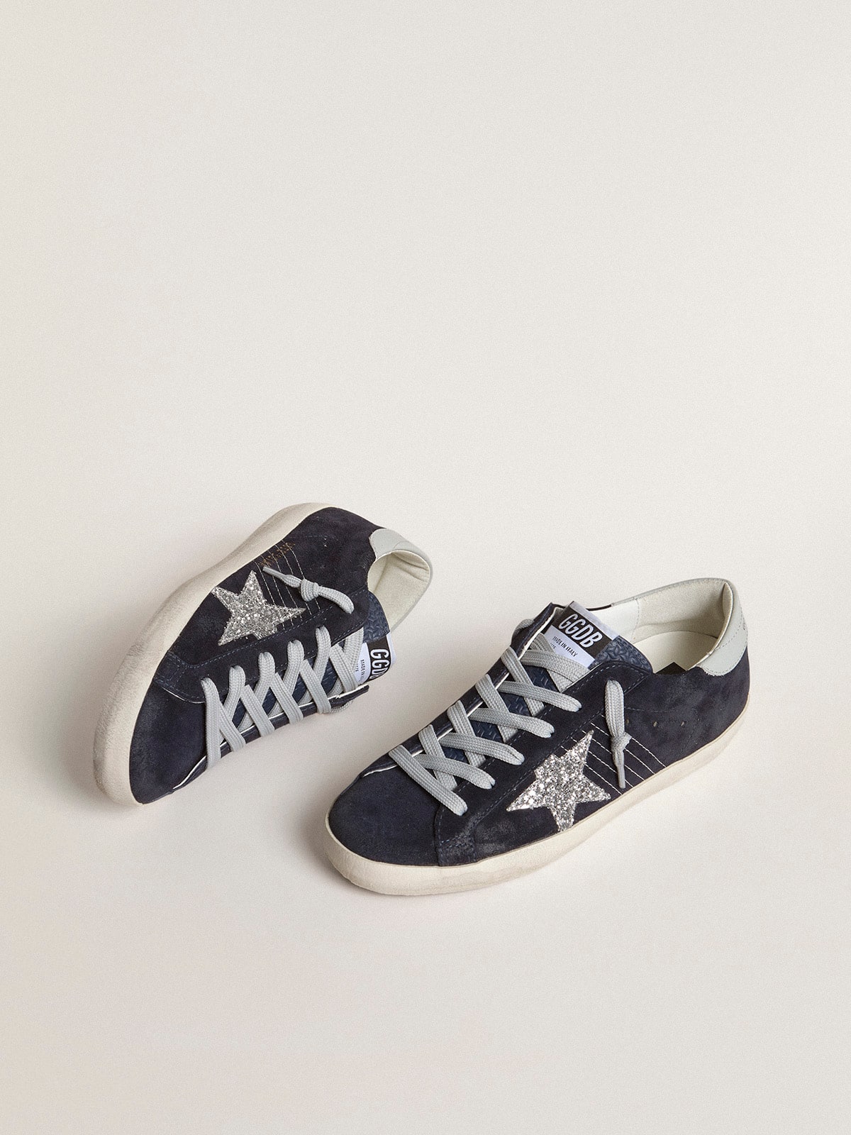 Women’s Super-Star in blue suede with silver glitter star and leather heel tab