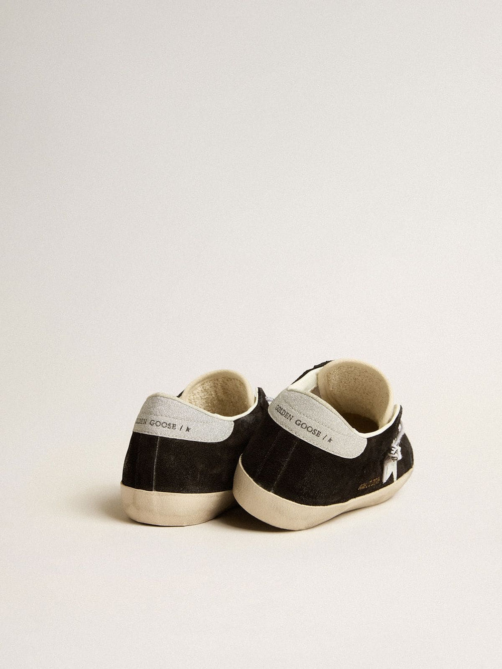 Women's Super-Star LTD in black suede with white printed star and silver glitter heel tab