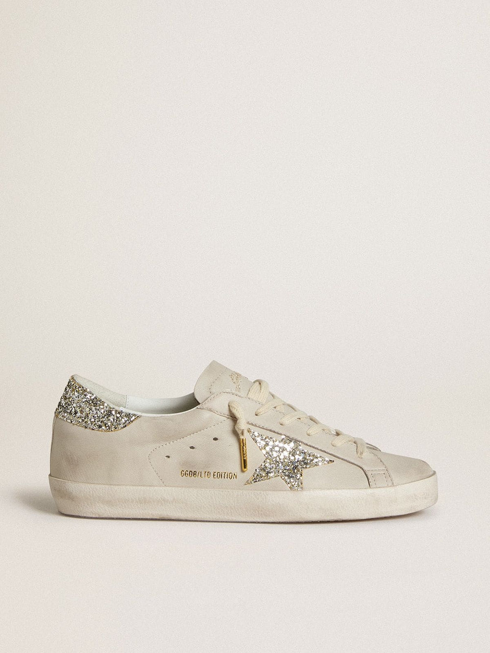 Women's Super-Star in ivory nappa leather with platinum glitter star and heel tab