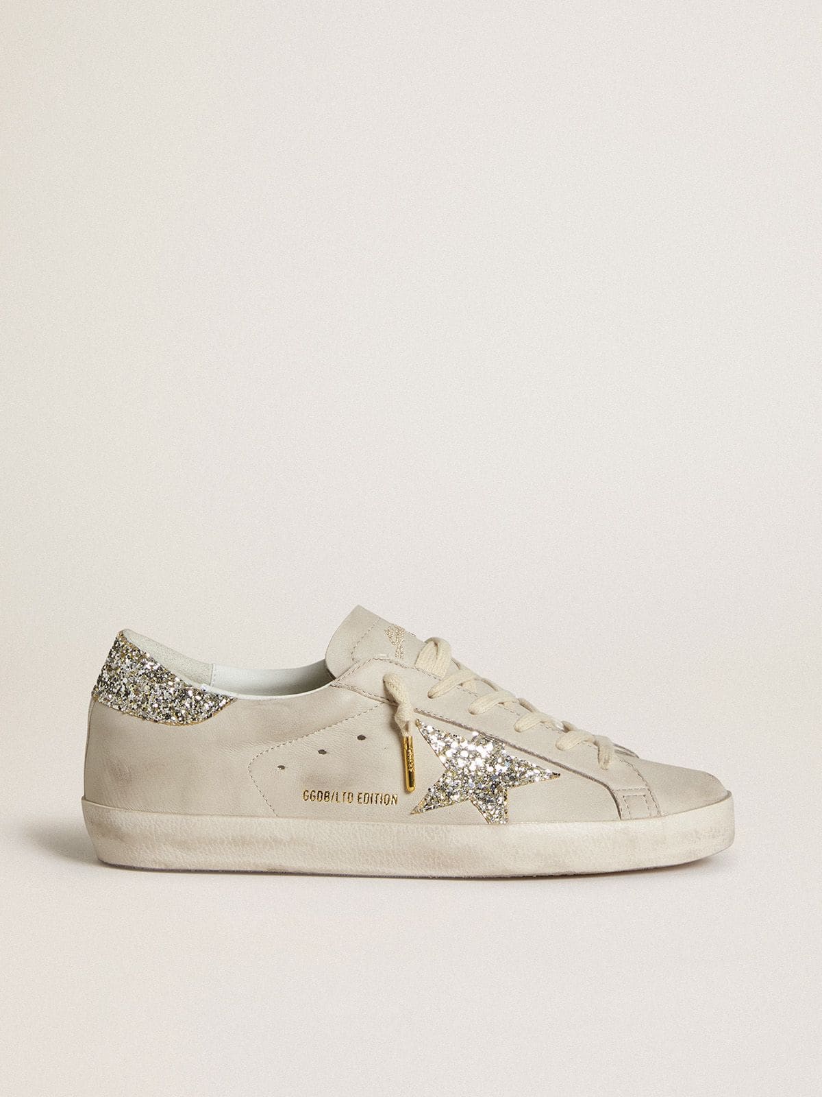 Women's Super-Star in ivory nappa leather with platinum glitter star and heel tab