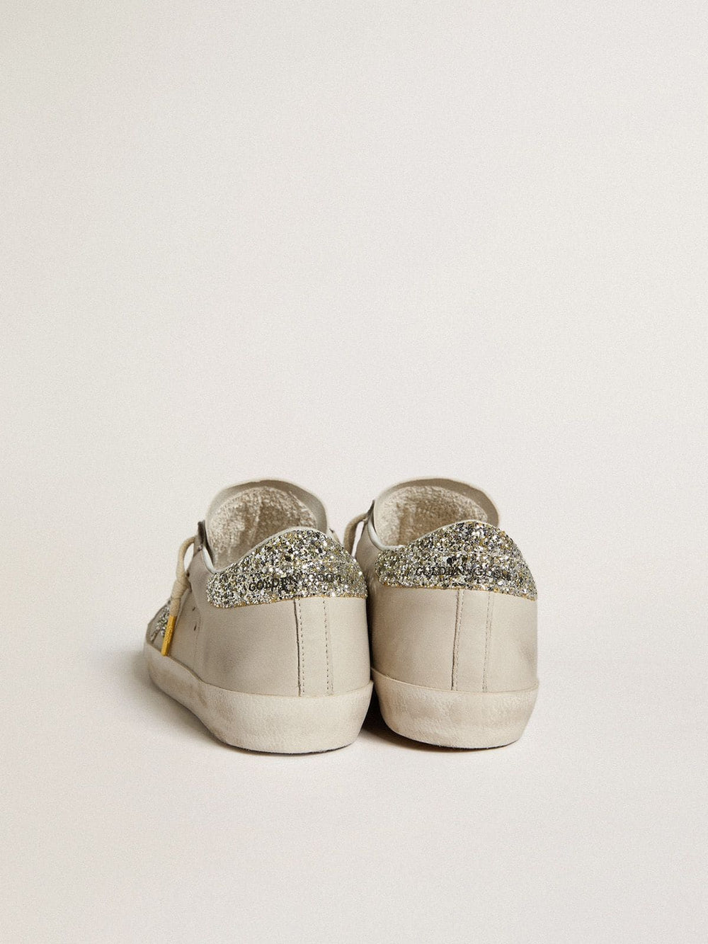 Women's Super-Star in ivory nappa leather with platinum glitter star and heel tab