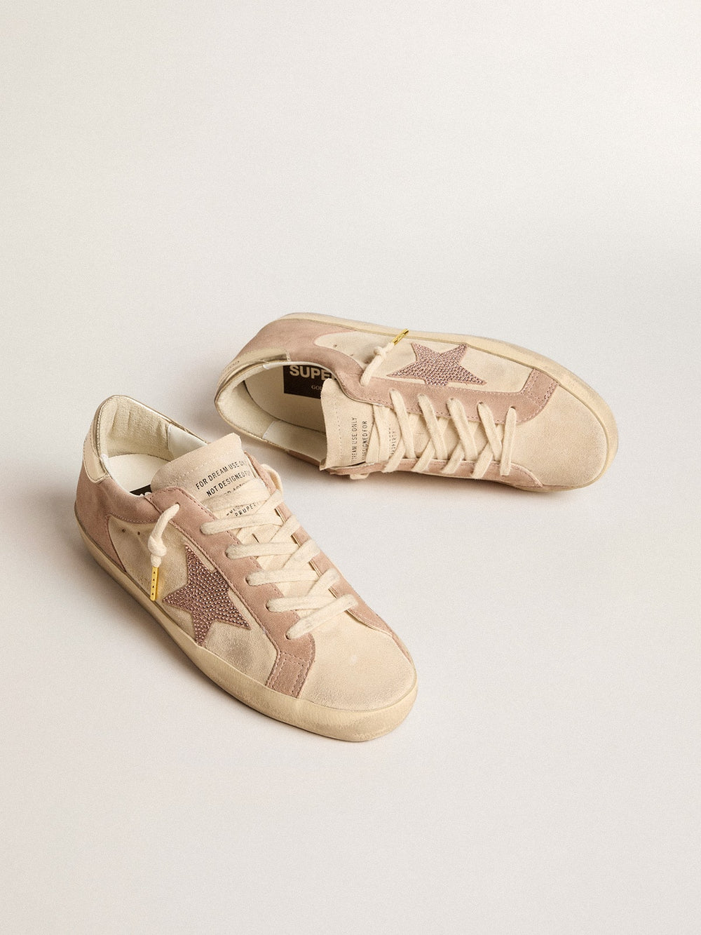 Woman's Super-Star in pale pink suede with suede star and platinum heel tab